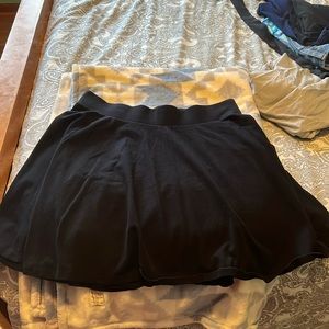 I am selling a simple black skirt that is in fair condition.